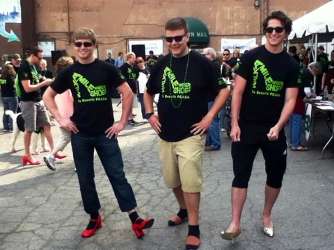 UIS students participating in Walk A Mile In Her Shoes