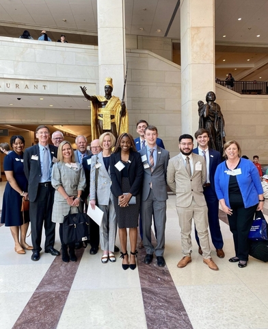 Chancellor Gooch, members of the SGA, and guests posing in the rotunda of the federal capitol