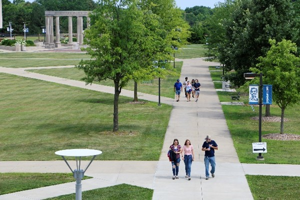 students walking across the quad