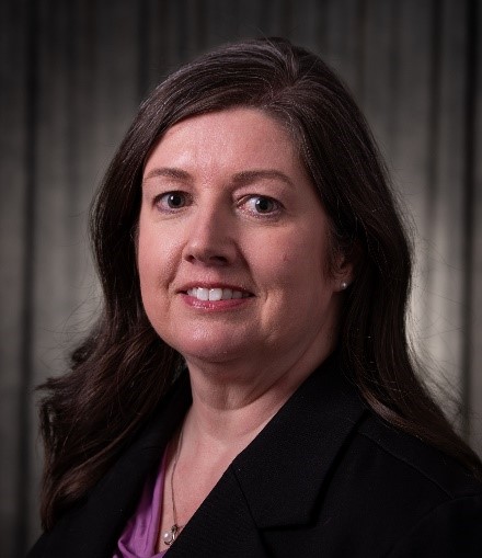 Michele Gribbins head-and-shoulders photo in business attire