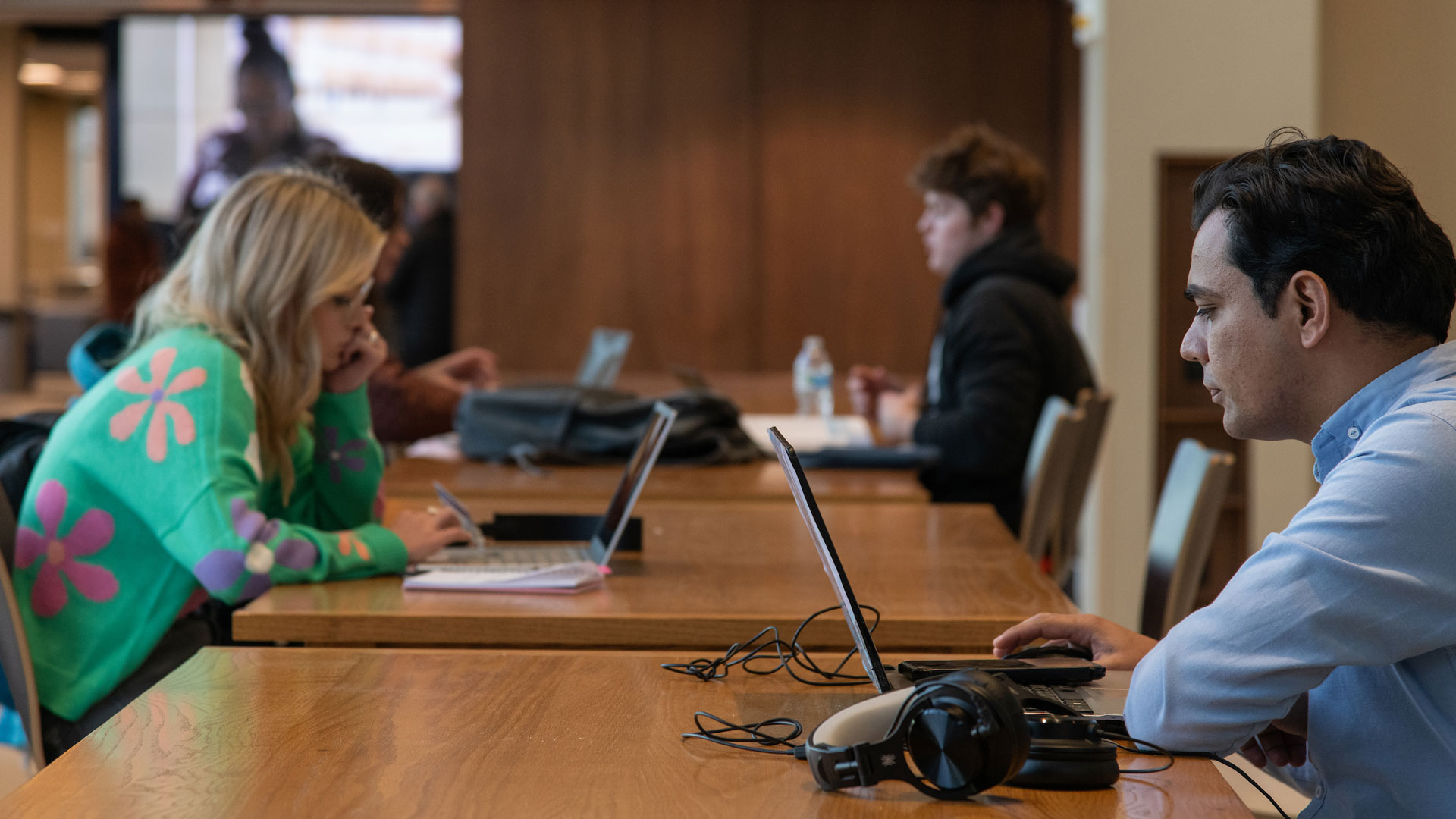students at the Student Union working on their laptops