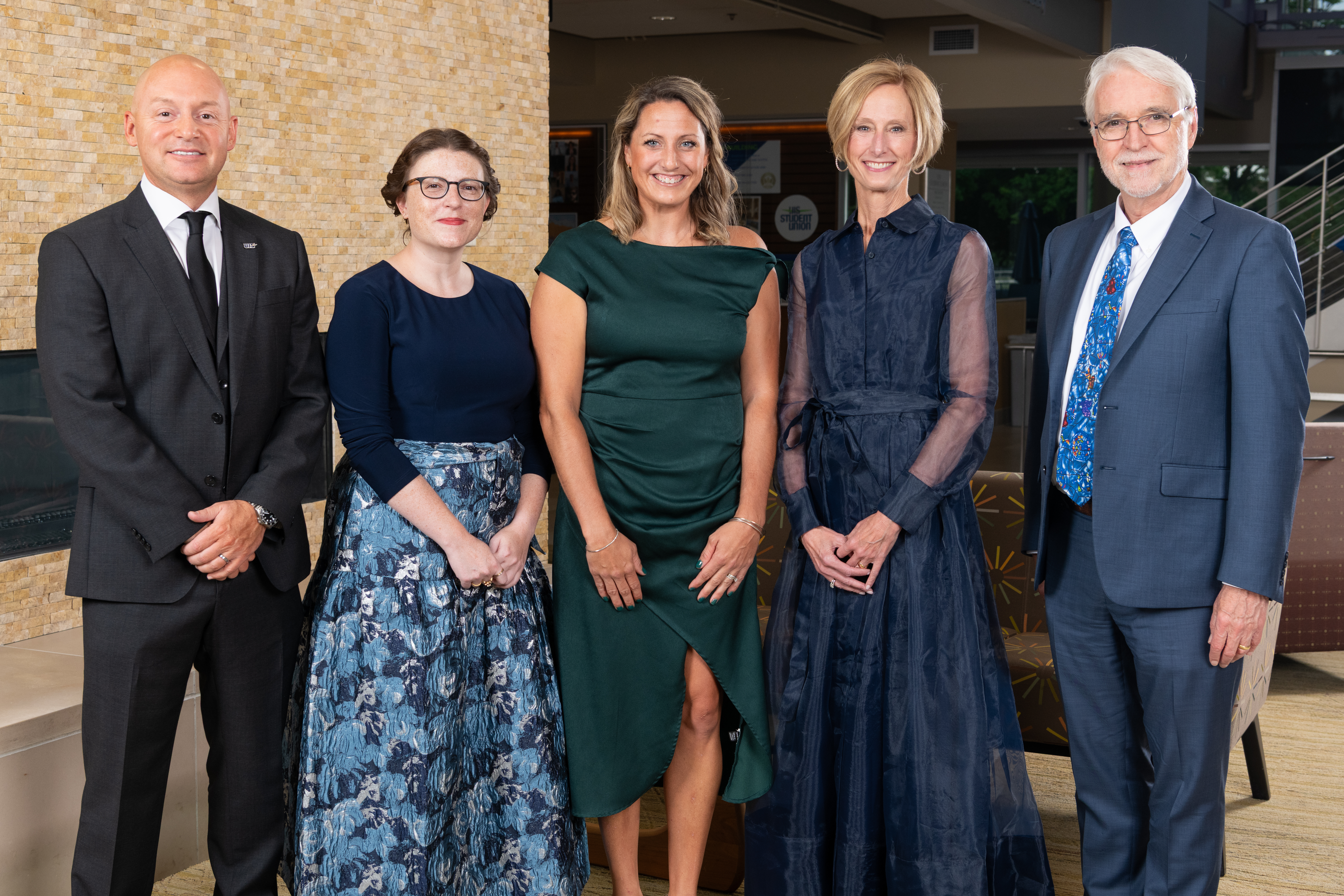 alumni rising star award winner with UIS and U of I System leadership