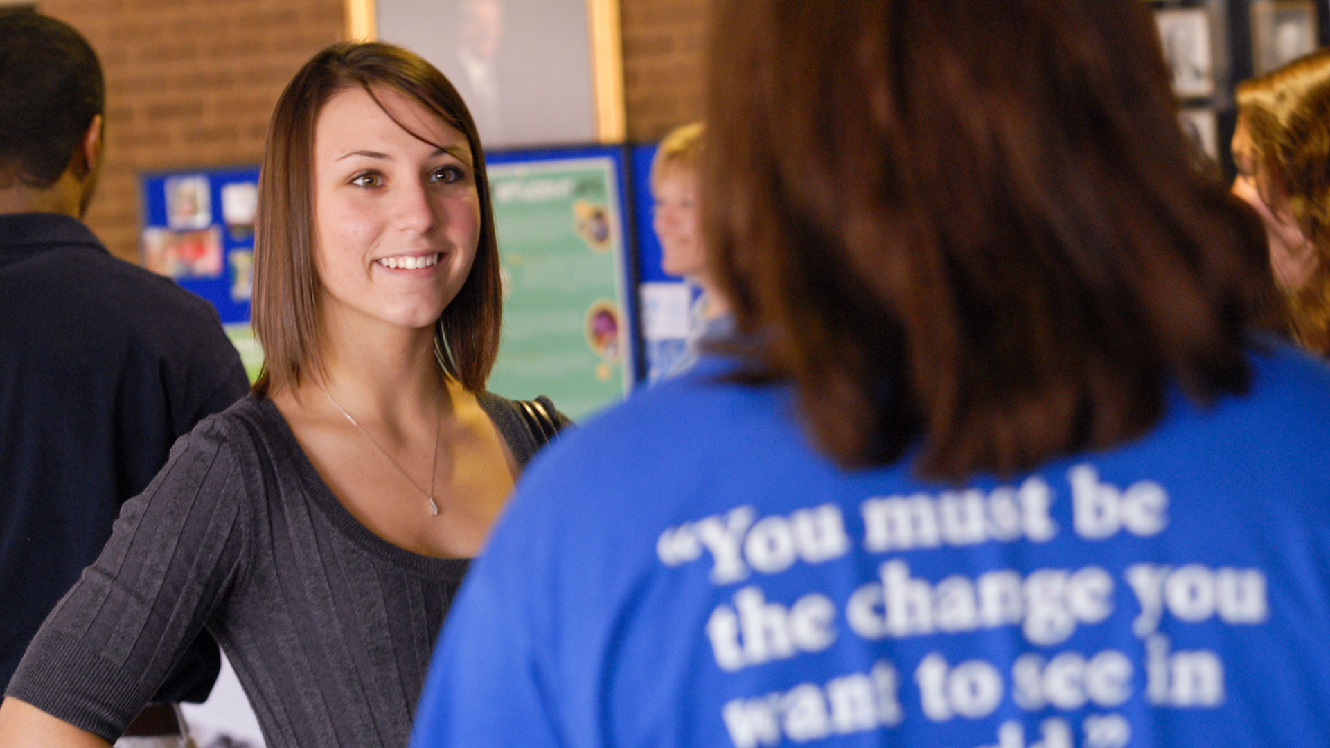 a student volunteering at a center