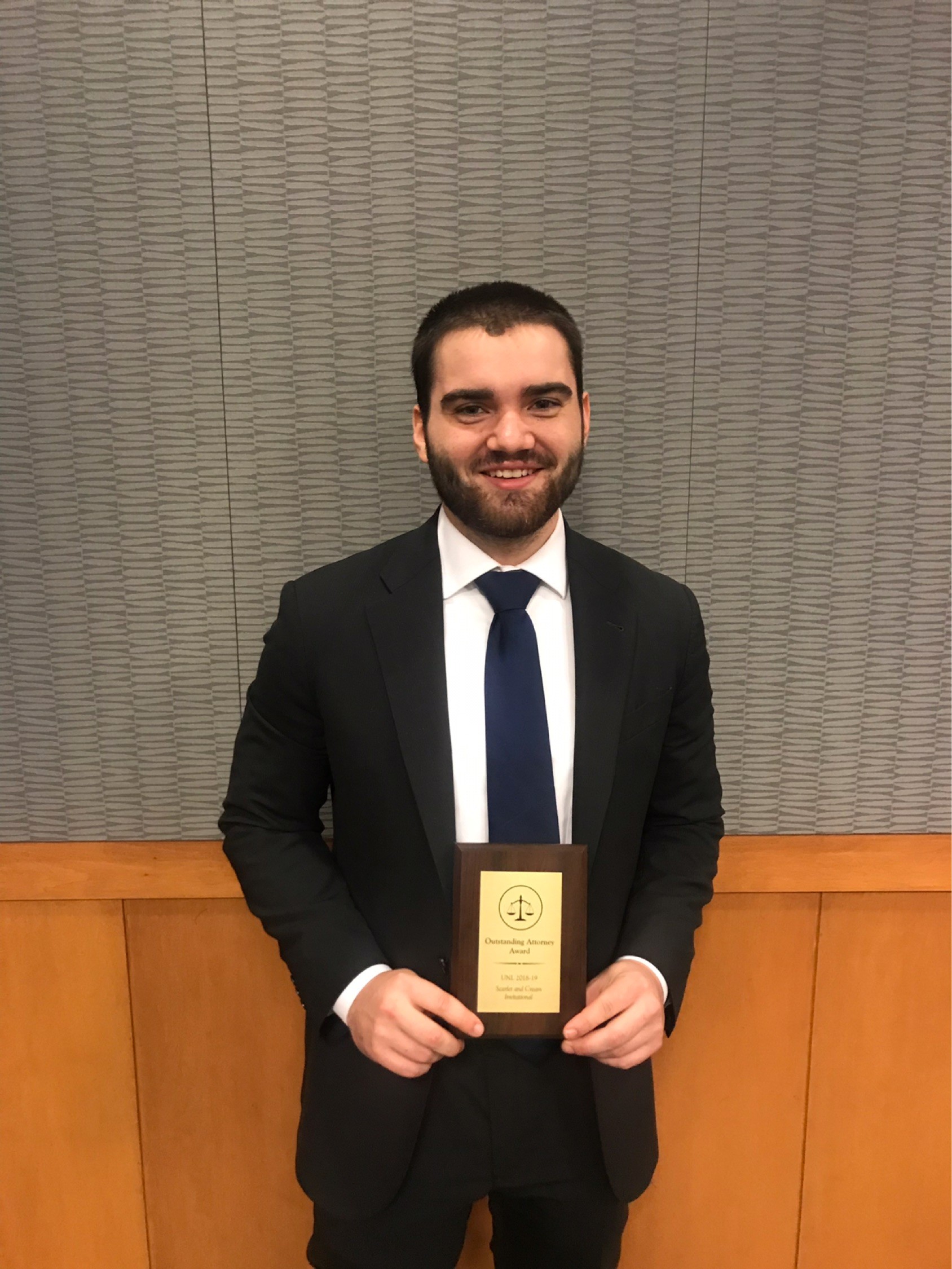 Andrew Jarmer with their award
