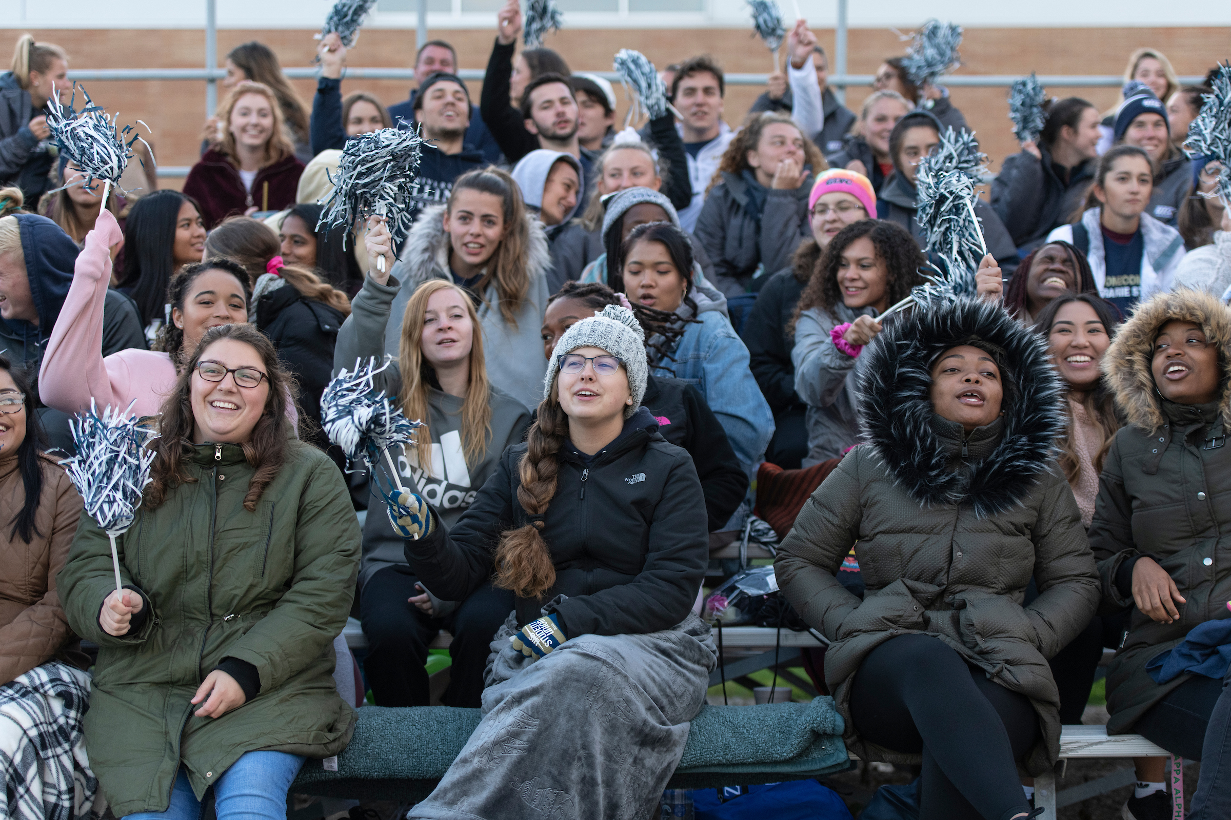 UIS Students cheering on from the bleachers