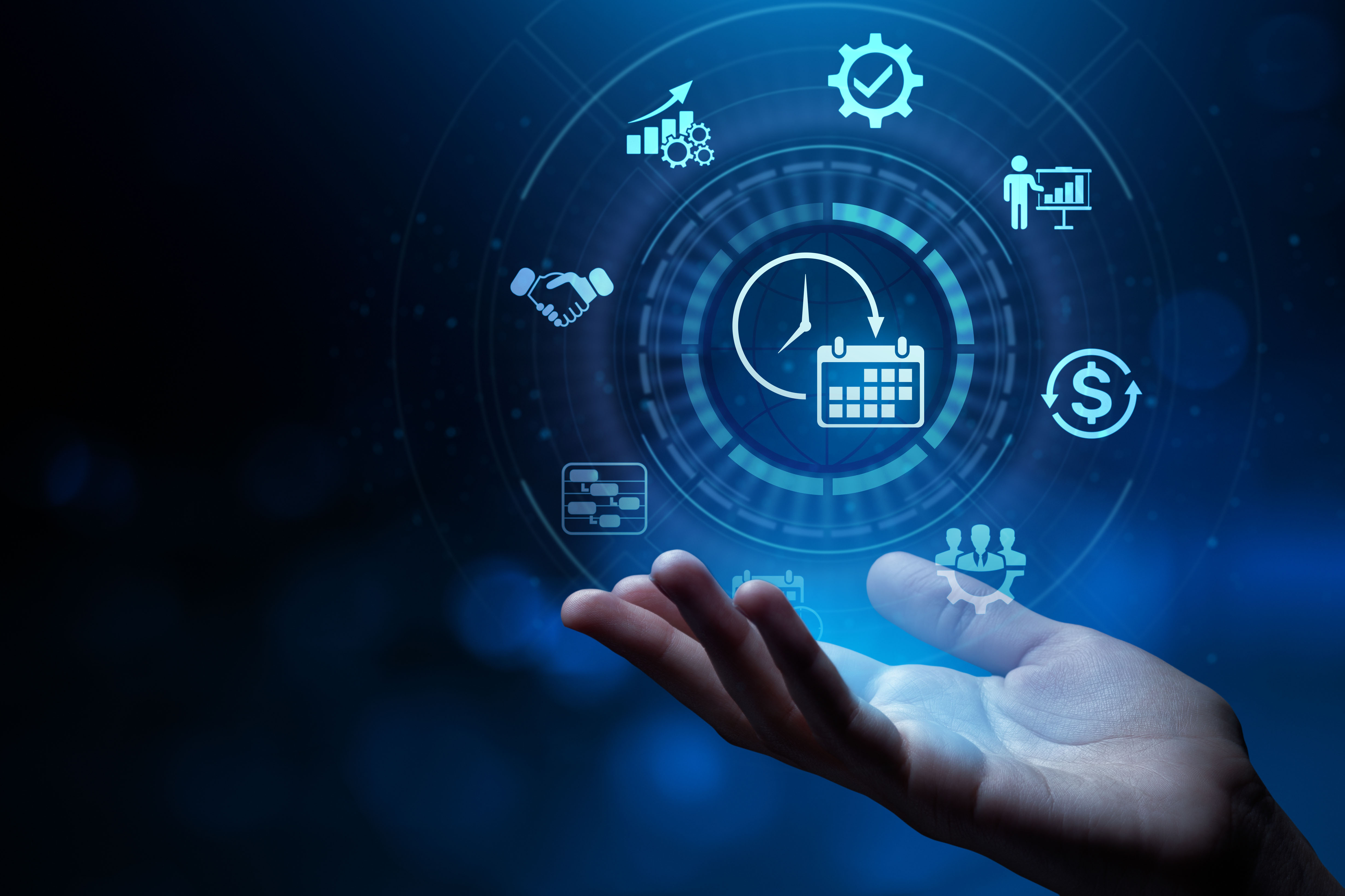 Hand holding digital business and management icons