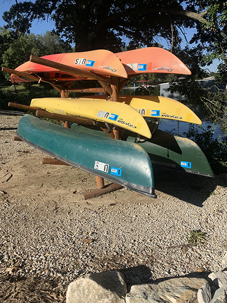 a rack storing 6 kayaks at the UIS field station