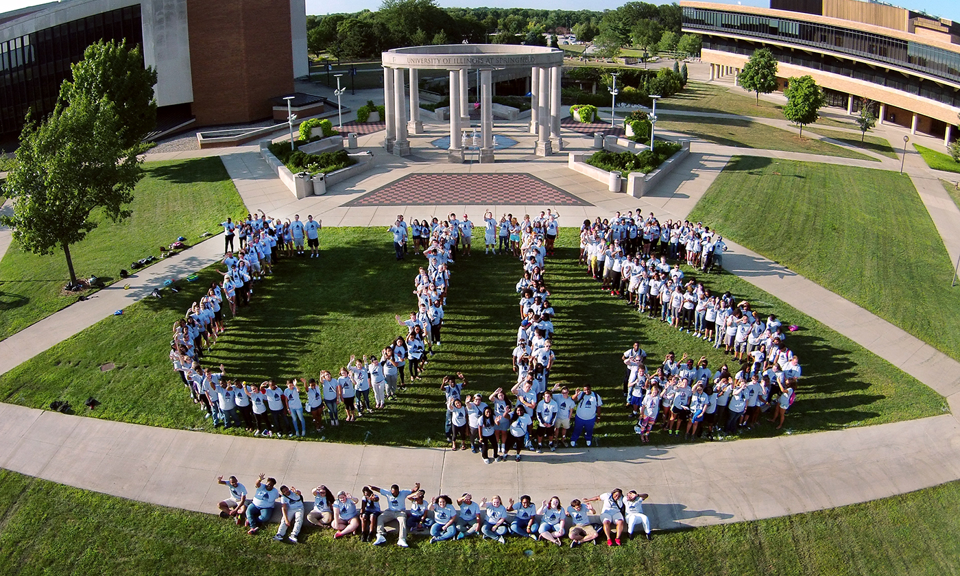 Students posing in front of the Colonnade