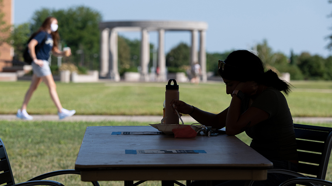 Student studies on quad