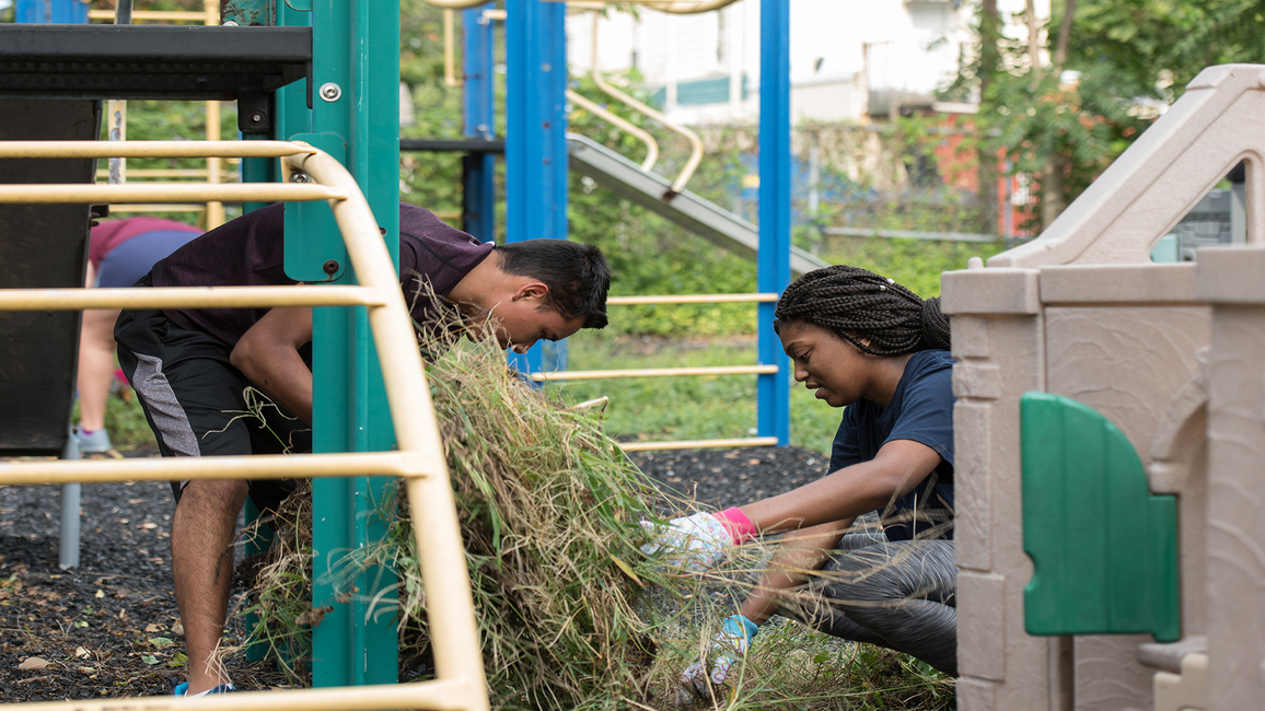 Students volunteer at the 2018 Service-A-Thon by cleaning up a nearly playground.