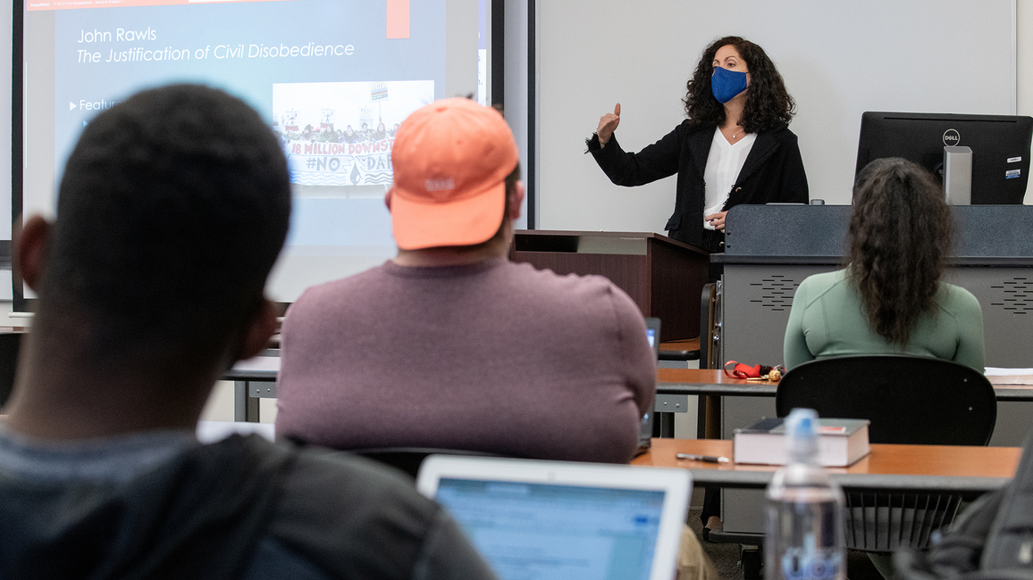 Professor teaching in-person class