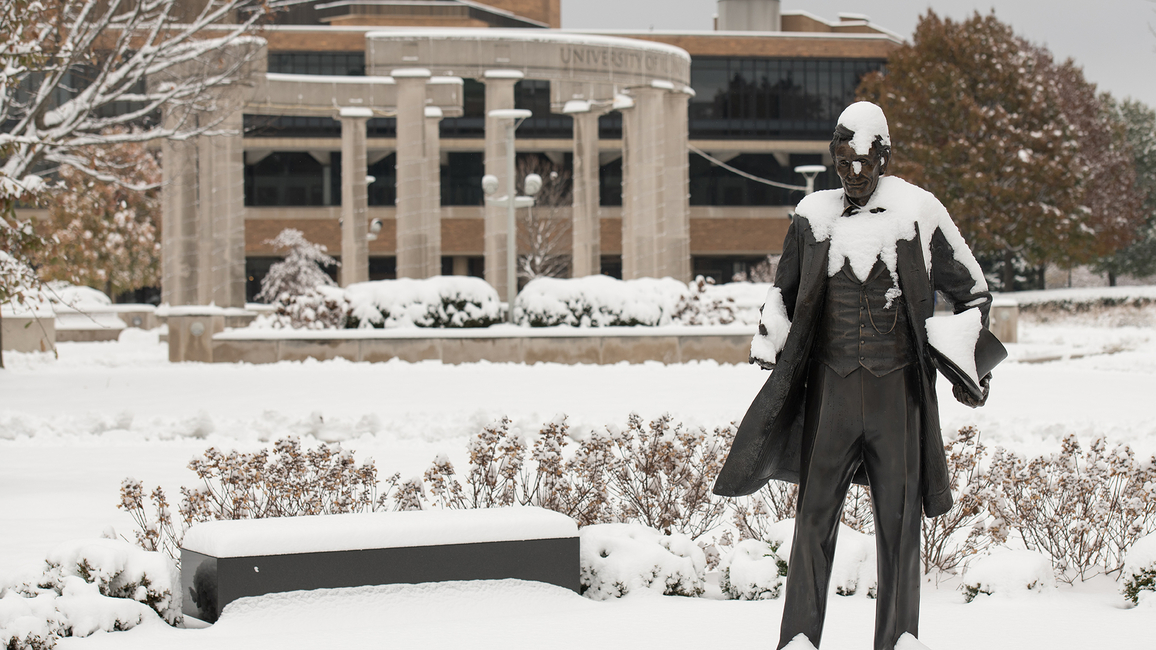 Snow covered Lincoln statue and colonnade 