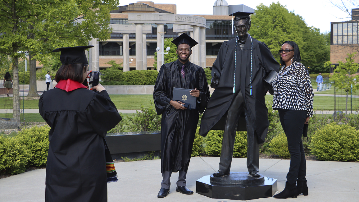 Graduate in cap and gown