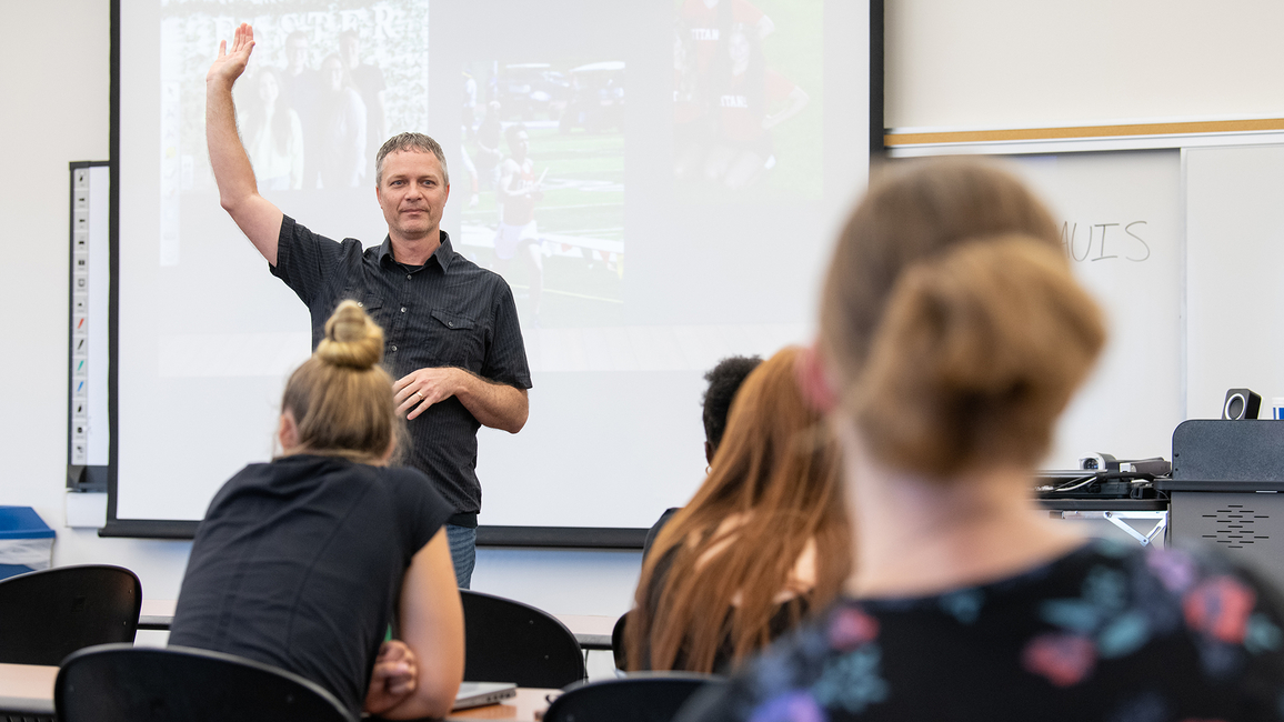 Professor teaching in-person class