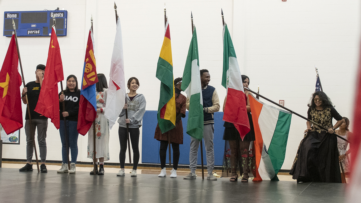 Students holding flags at the International Festival