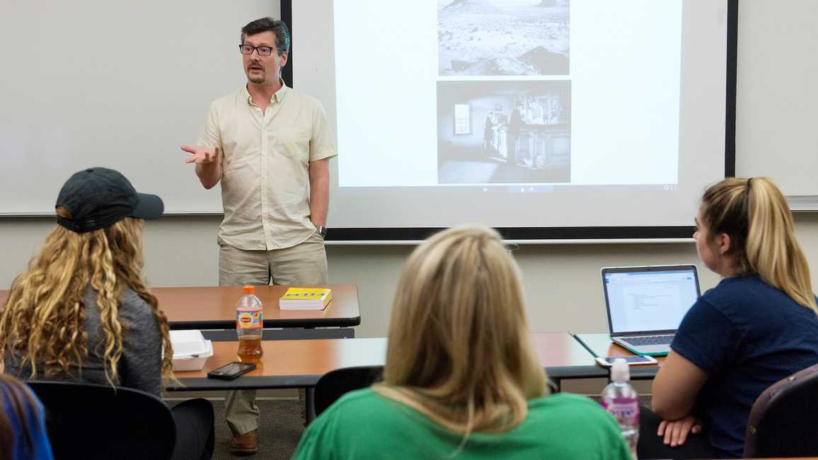 Professor teaching in-person class