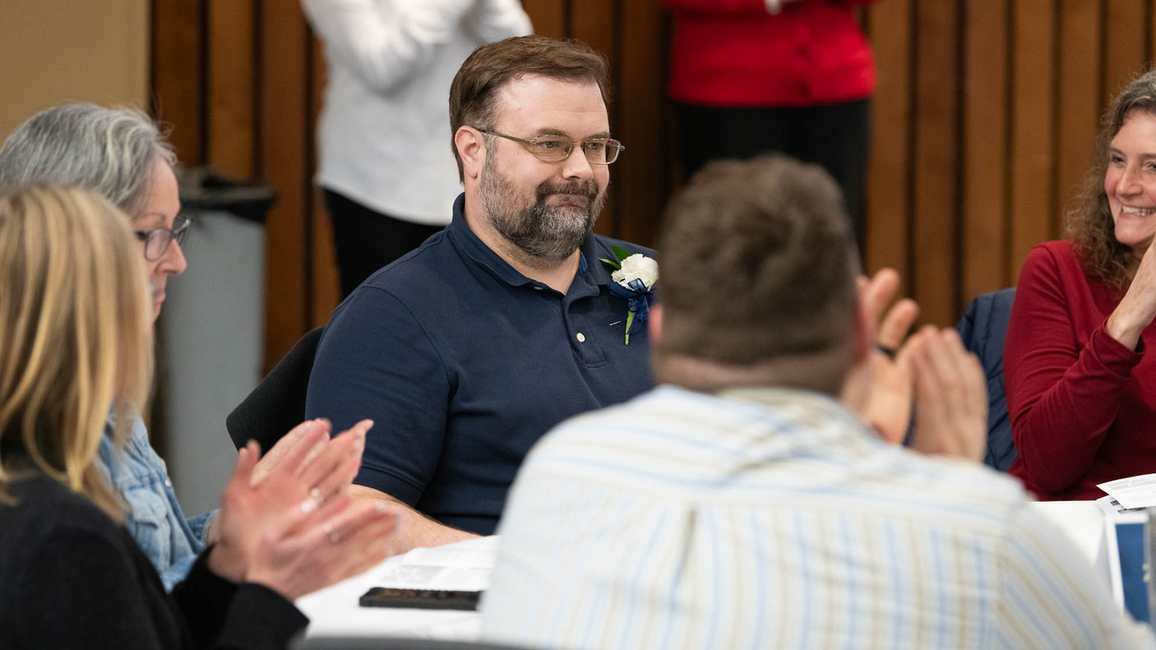 Zach Logsdon reacts after being named the Employee of the Year.