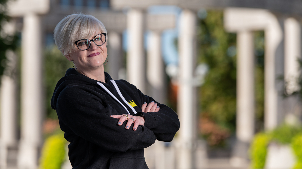 Jennifer Martin standing in front of the UIS colonnade 