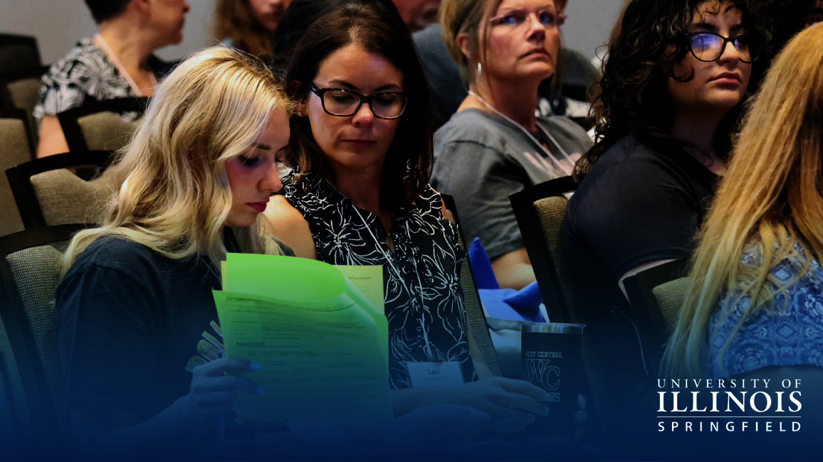 Mother and daughter looking over notes at Orientation.