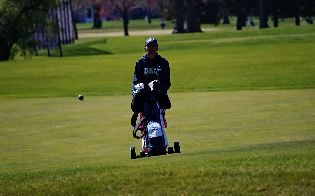 Ira Joshi walking on golf course