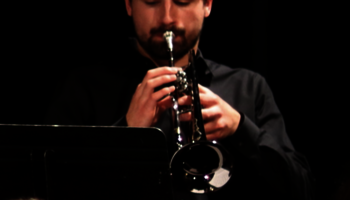 man playing trumpet