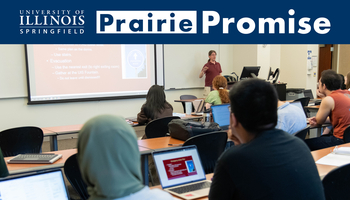 Photo of a UIS class with the Prairie Promise logo