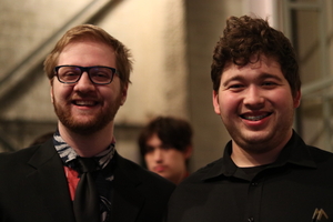 photograph of two student musicians smiling 