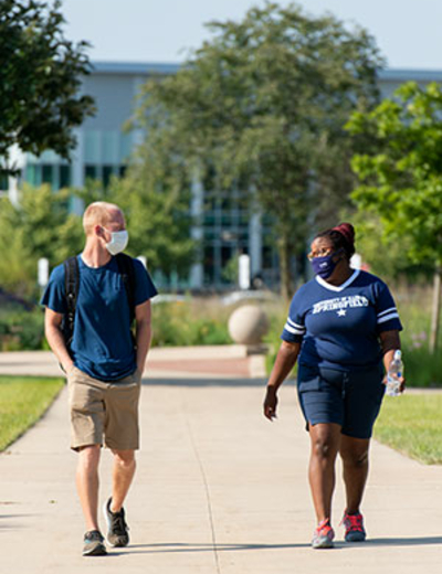 students walking on campus