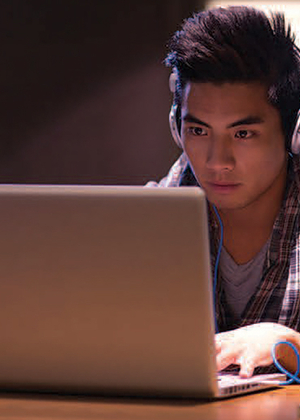 student at laptop