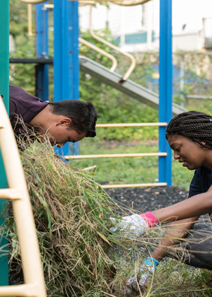 Students volunteer at the 2018 Service-A-Thon by cleaning up a nearly playground.