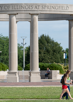 Students walking by UIS Colonnade