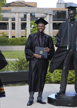 Graduate in cap and gown