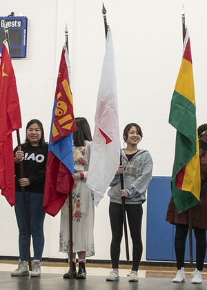 Students holding flags at the International Festival