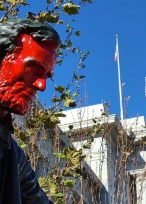 Sculpture of Abe Lincoln with a red mask