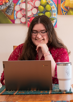 Online student using computer to study
