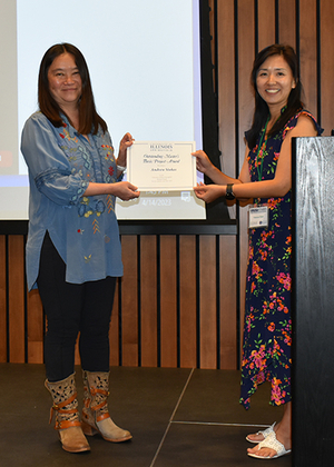 Faculty holding award