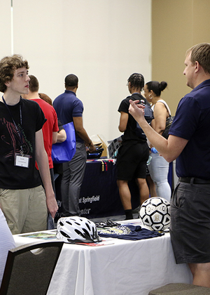 Student meeting with staff