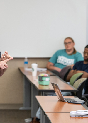 Professor teaching in-person class