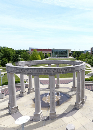 An aerial view of the UIS colonnade on the University of Illinois Springfield campus on a dunny day during the summer season.