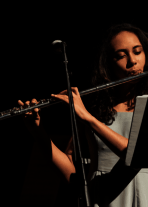 student playing flute