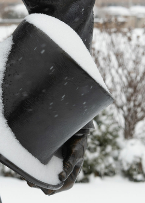 close up of statue of Lincoln's top hat covered in snow