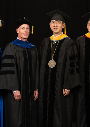 Yanhui Guo poses with UIS leaders during his Ceremony of Investiture.