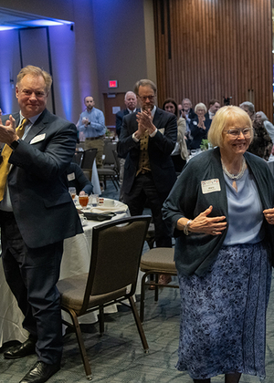 Mary Mitchell Beaumont walks to the stage to receive the 2025 William E. Winter Award.