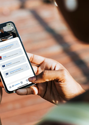 Person holding a smartphone, reading messages.