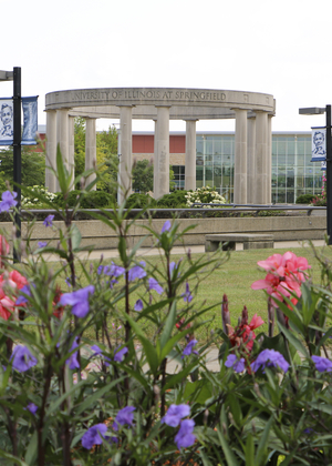 Colorful flowers in front of the UIS Colonnade