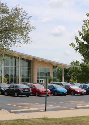 Cars parked in front of the Student Union.