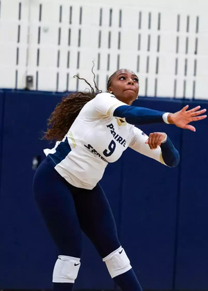 Erica Sledge serves