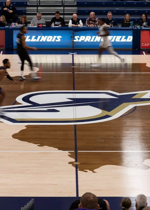UIS men's basketball long exposure court shot