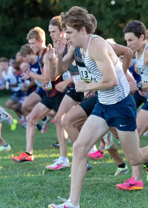 Men's Cross Country runners take off from the starting line