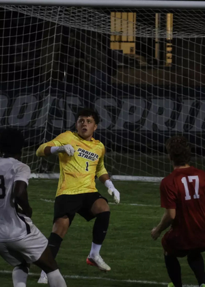 Kevin Kardel in goal for UIS, wearing yellow